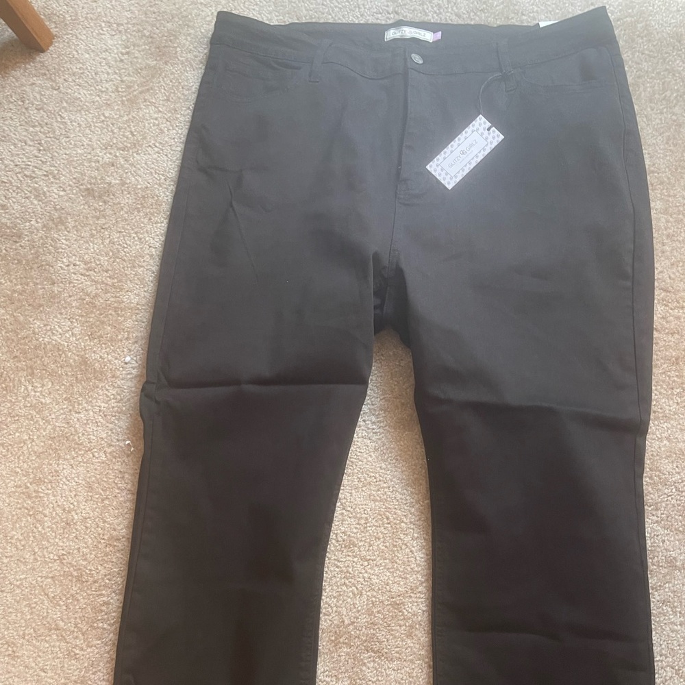High waisted black jeans with frayed ends